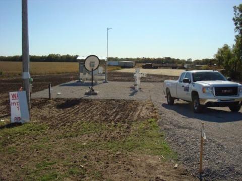 image of a truck outside a midstream facility