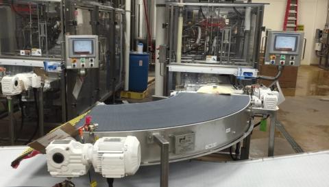 image of a conveyor belt inside a manufacturing facility, Decker Electric handles installation of automated equipment