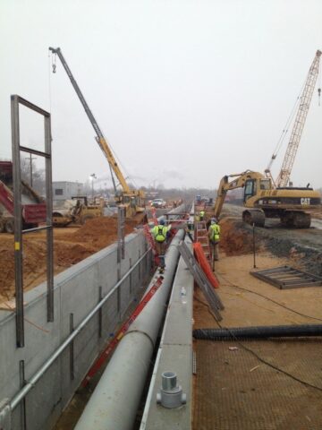 image of pipeline in Delaware of the DE Rail Unloading with Decker Electric staff