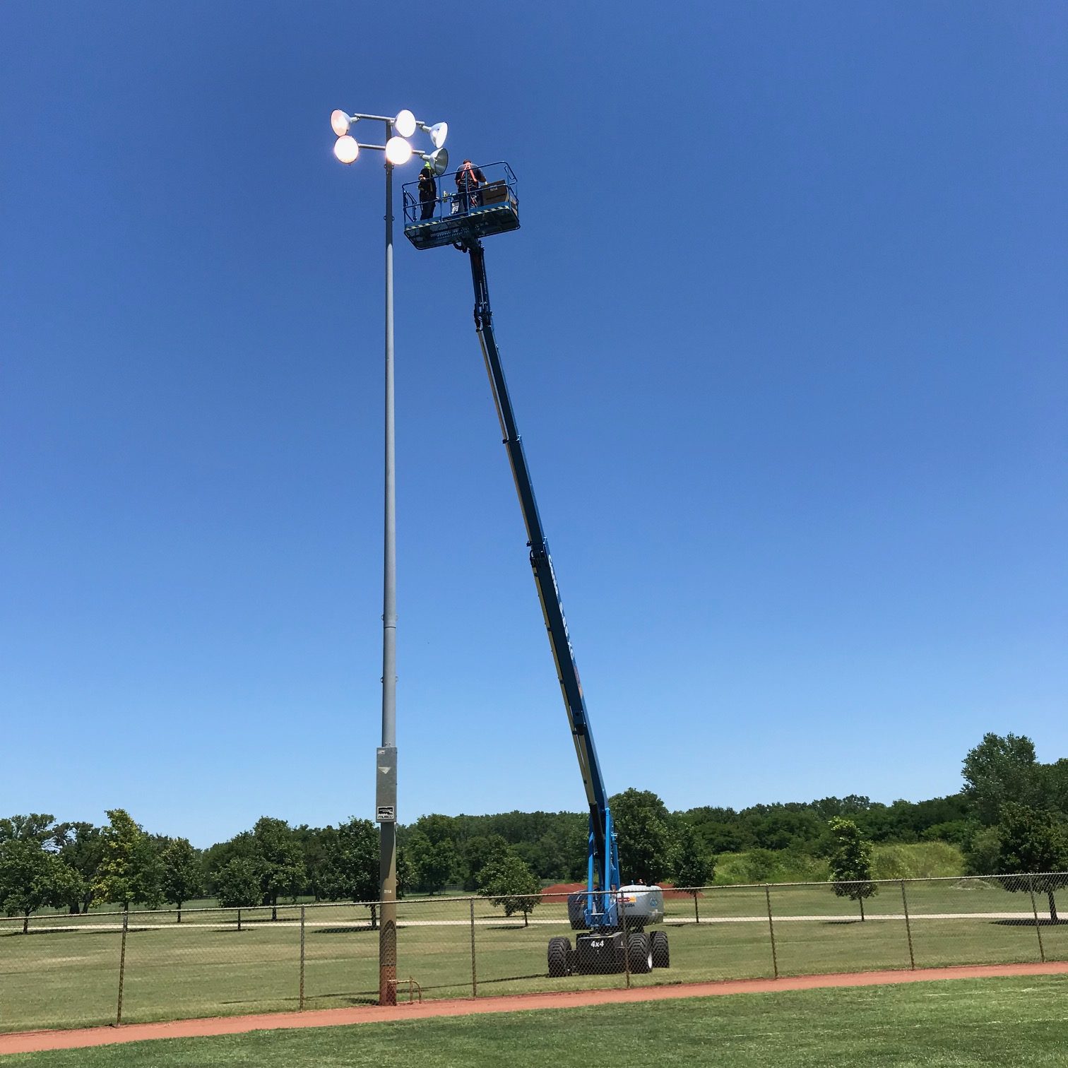 Decker Electric employee servicing City of Wichita outdoor lighting